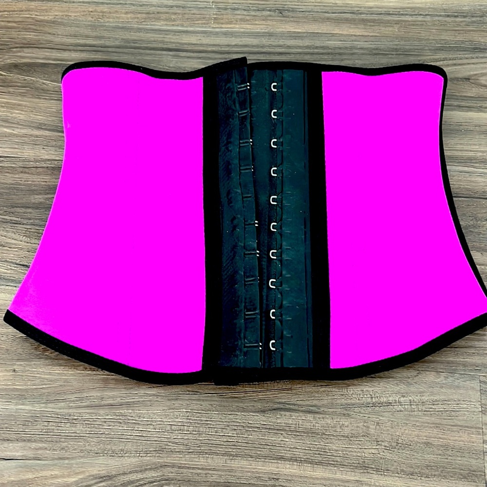 Ann Michell waste trainer size small magenta in color